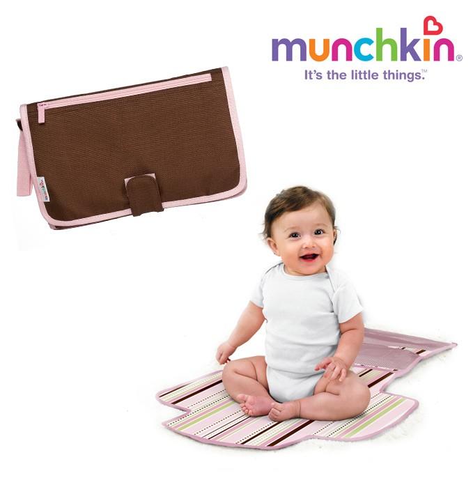 Munchkin Wickeltasche mit Wickelunterlage rosa